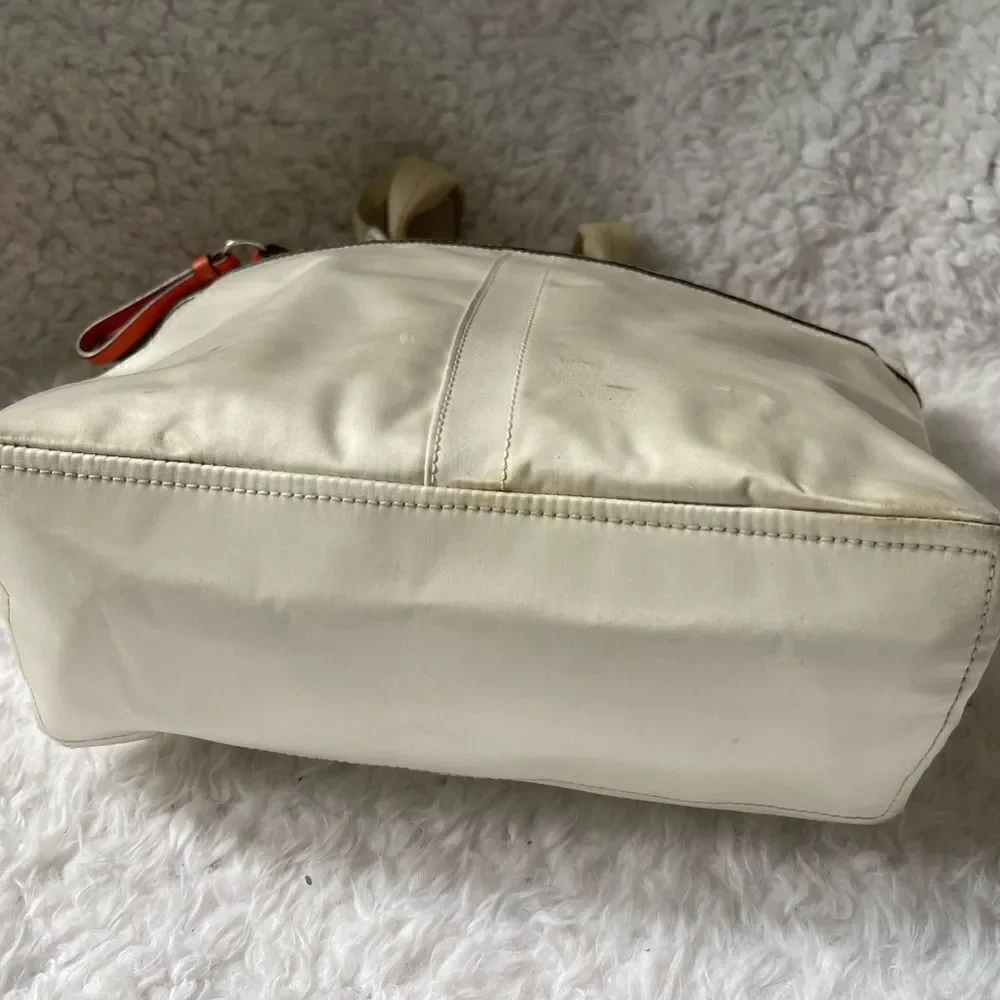 Coach Hampton Beige satin and orange accents satchel with silver tone hardwares